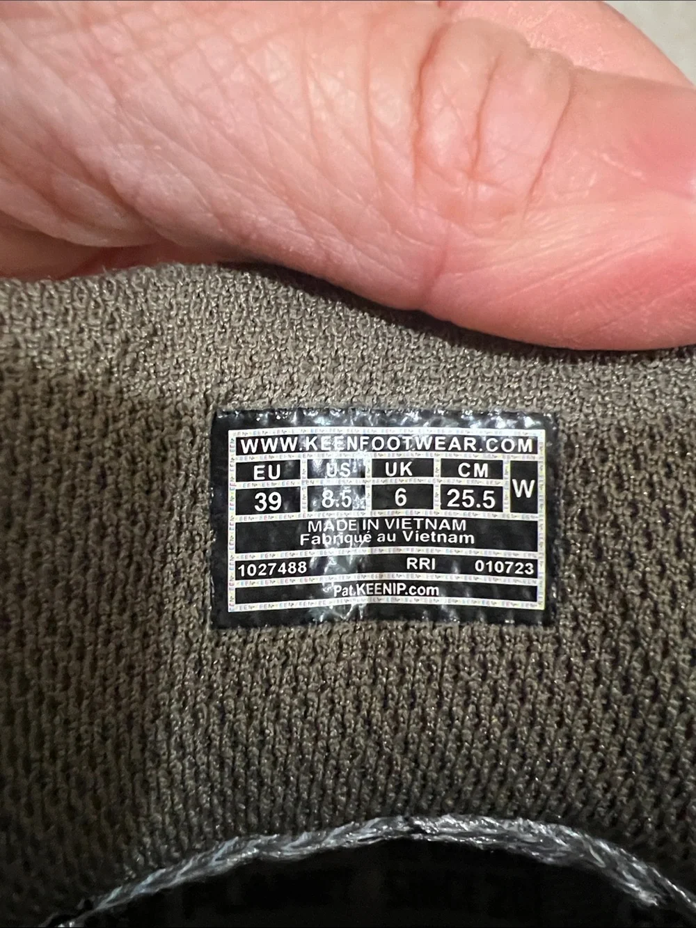 Keen tan and brown lace-up hiking boots